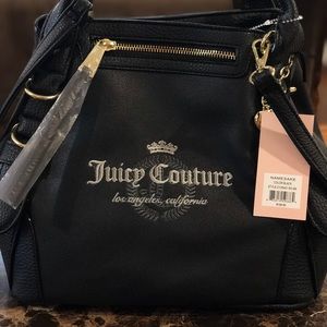 Brand new with tag Juicy Couture Bag.